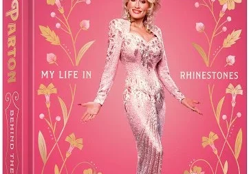 A book cover with a woman in pink dress.